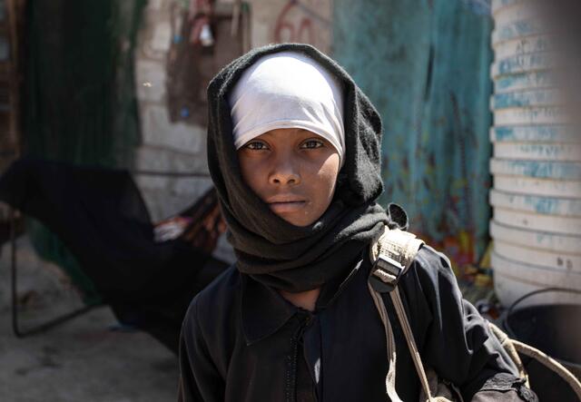 Aisha looks at the camera in Yemen