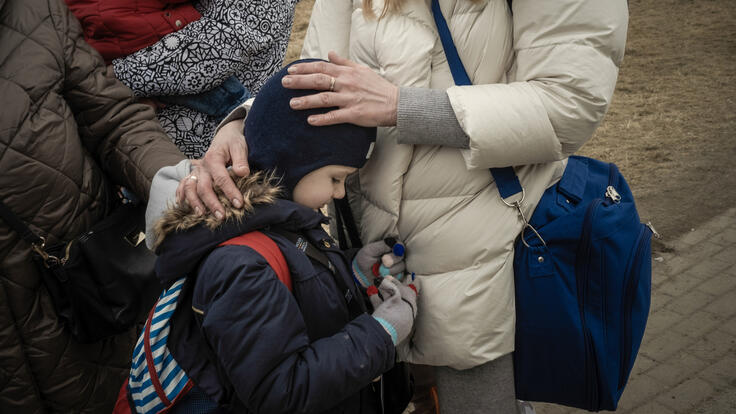  A Ukrainian refugee and her child at Medyka border crossing point, Poland